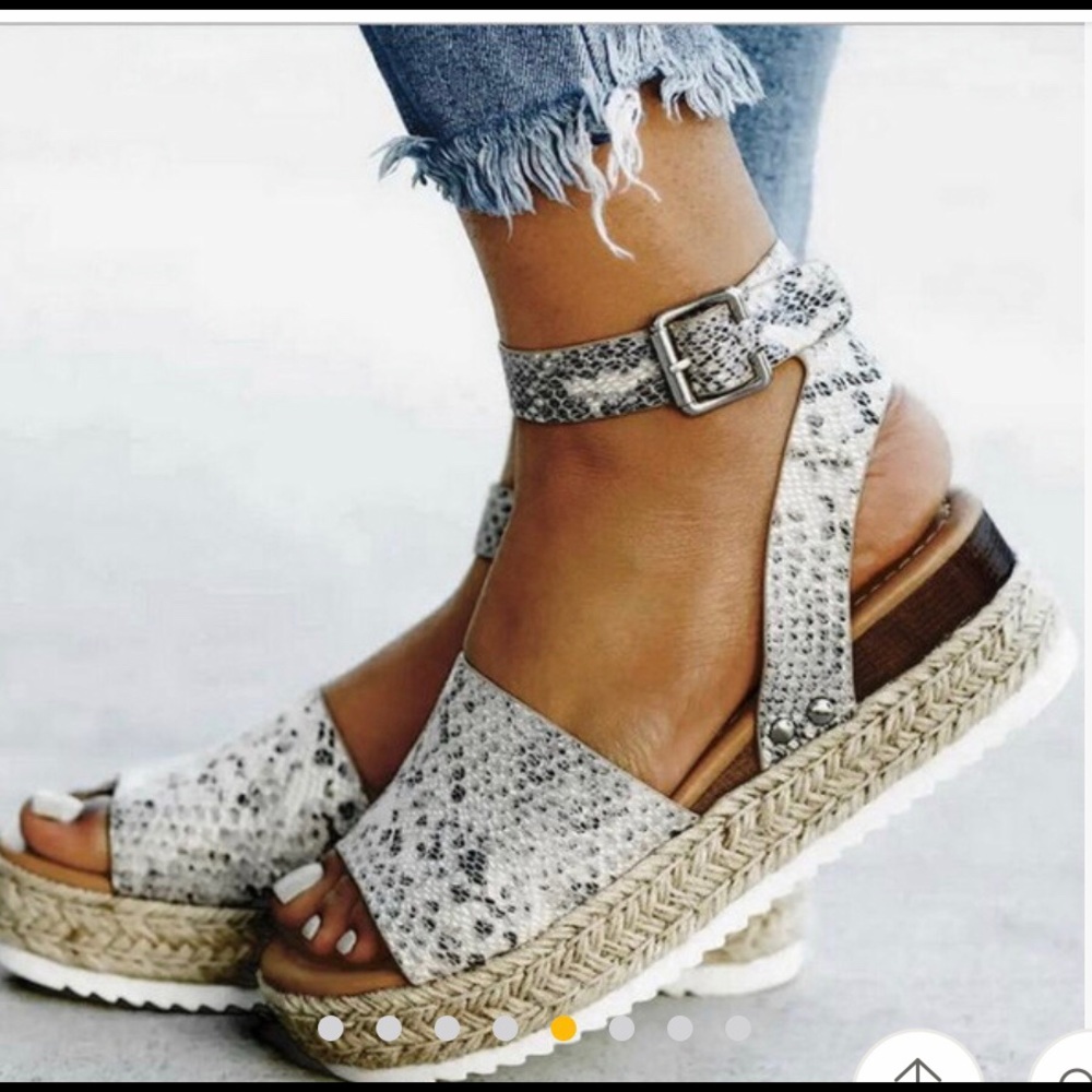Black, silver, and white platform sandals